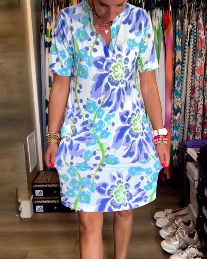 Vestido de manga corta con estampado floral y escote en pico