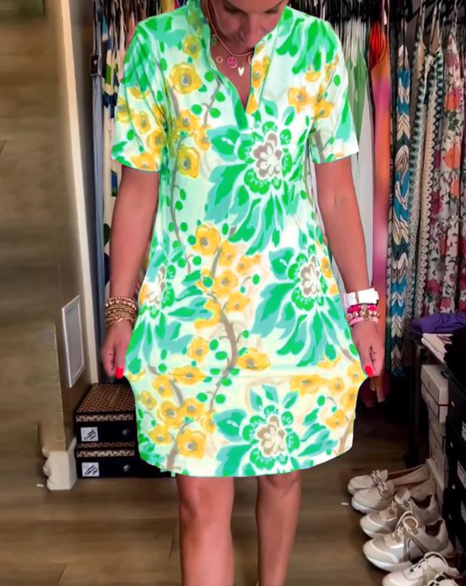 Vestido de manga corta con estampado floral y escote en pico