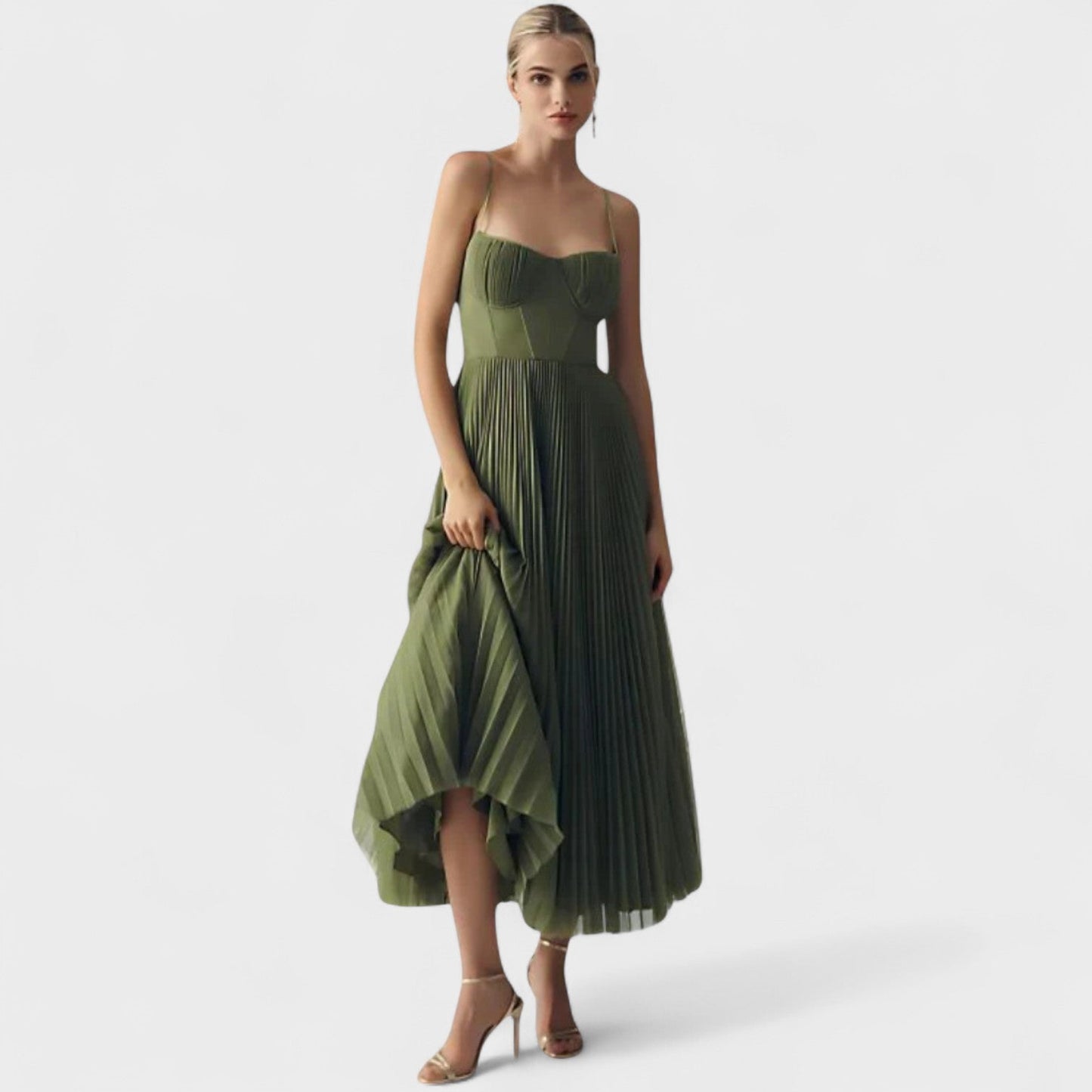 Elena – El vestido plisado que conquista con elegancia