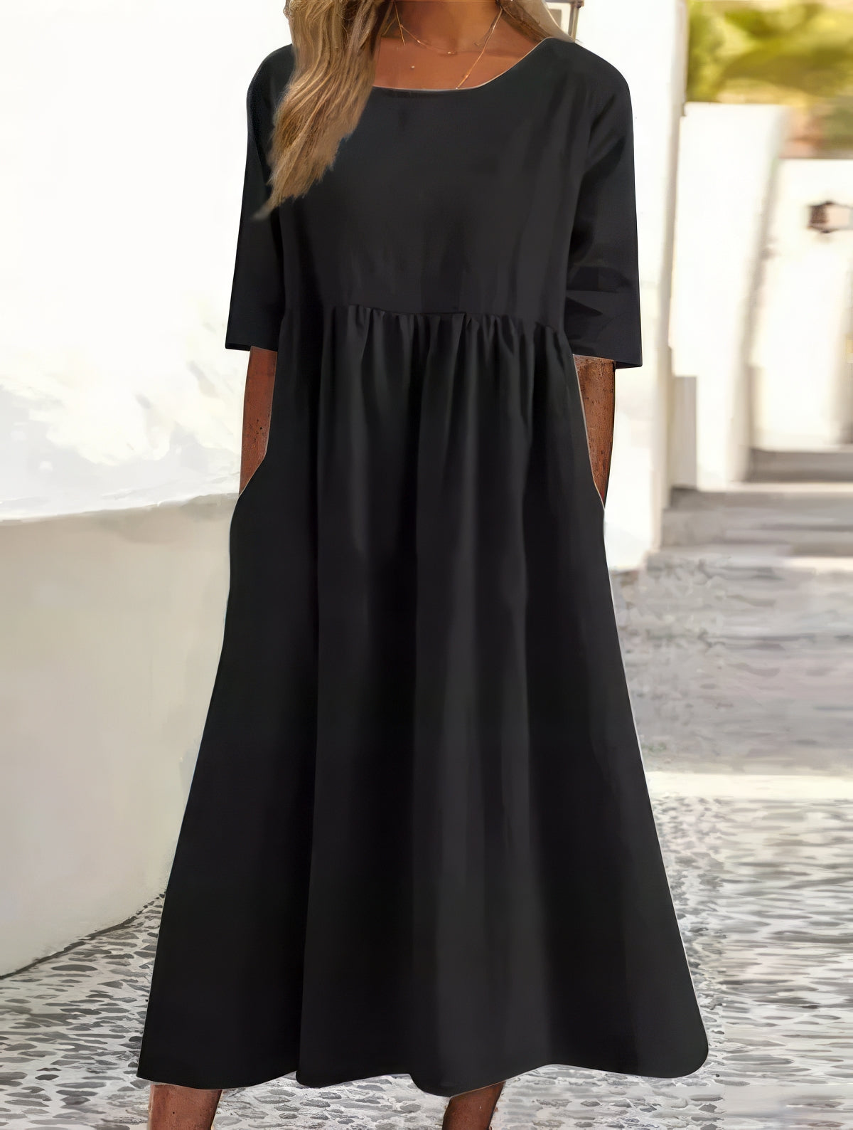 Vestido de algodón con cuello redondo y bolsillos