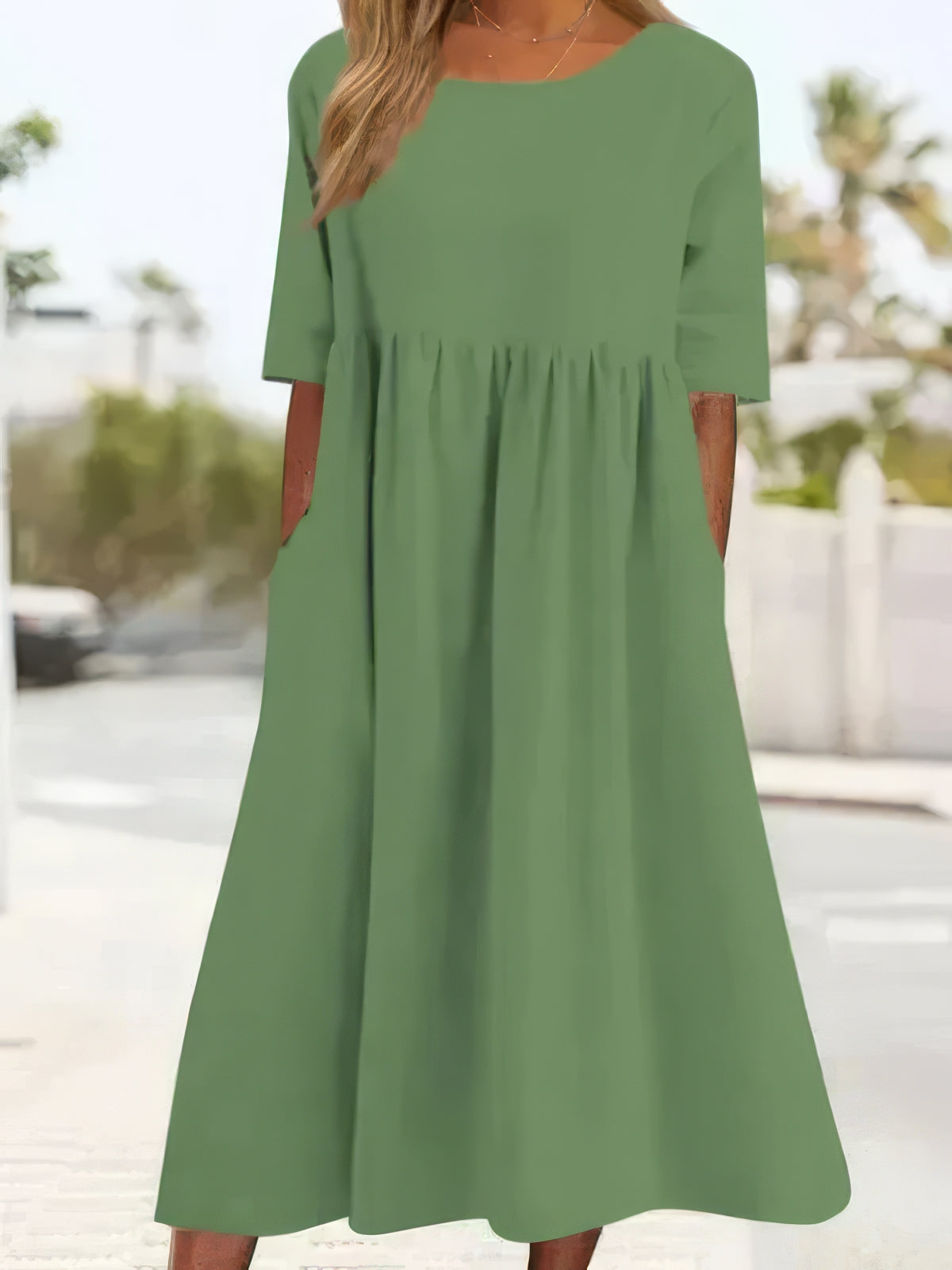 Vestido de algodón con cuello redondo y bolsillos