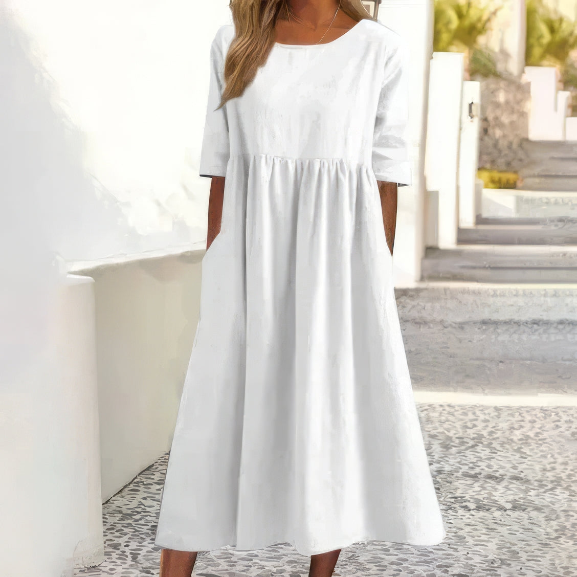 Vestido de algodón con cuello redondo y bolsillos